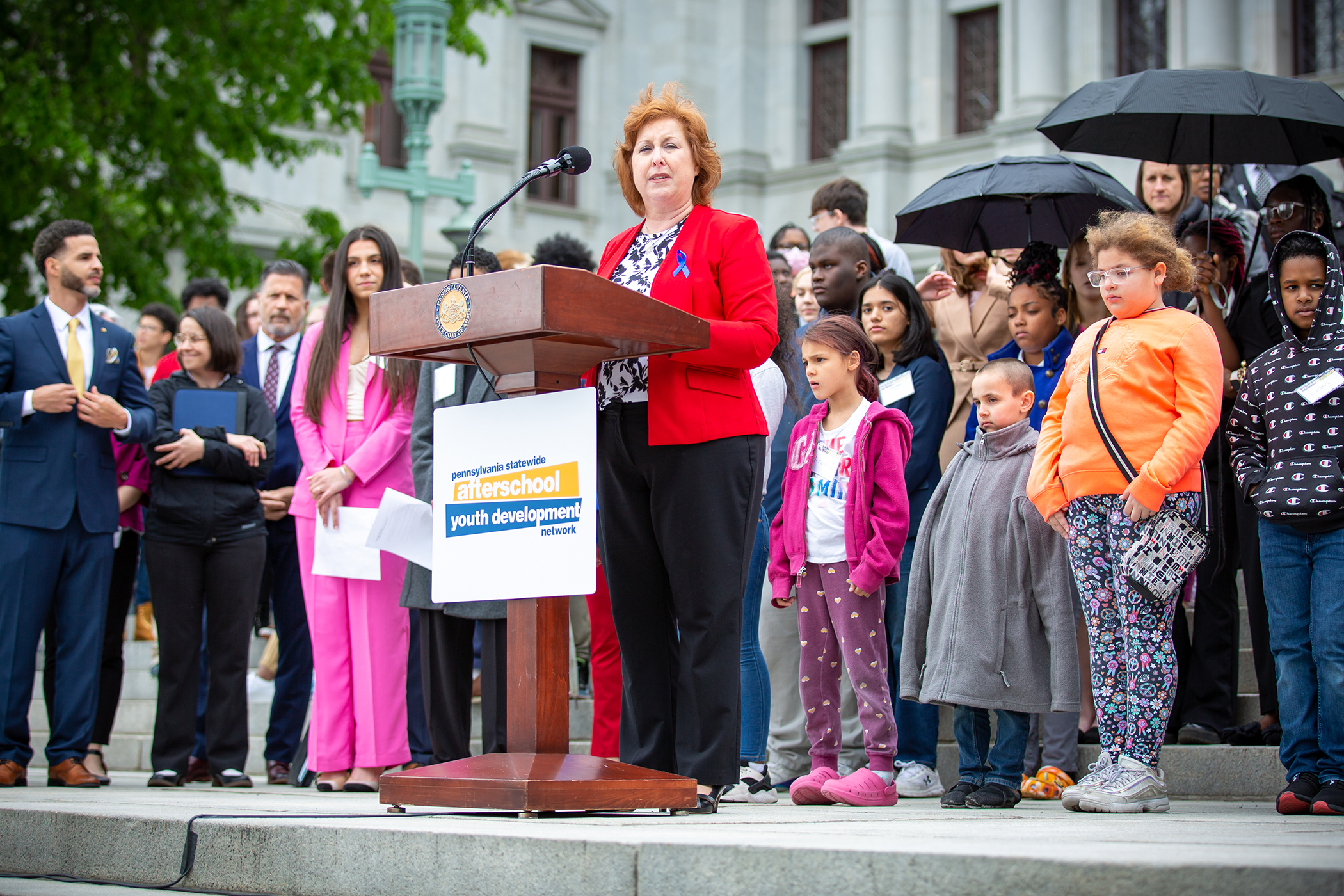 Senator Lynda Schlegel-Culver speaking at podium on Afterschool Advocacy rally