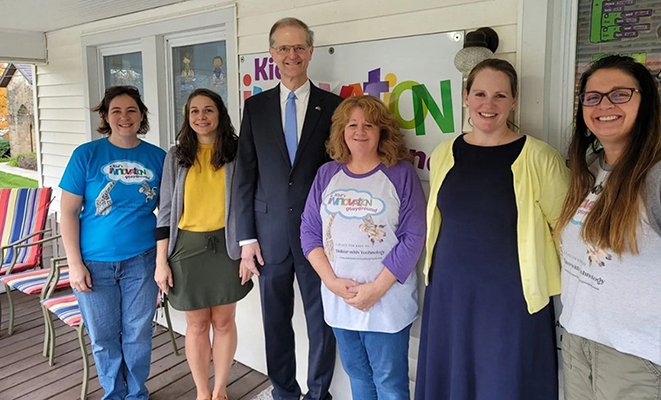 Senator Scott Hutchison visits Kid's Innovation Playground's open house.