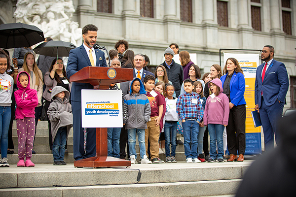 Contrell Armor speaking on Capitol steps during 2023 Advocacy Day.